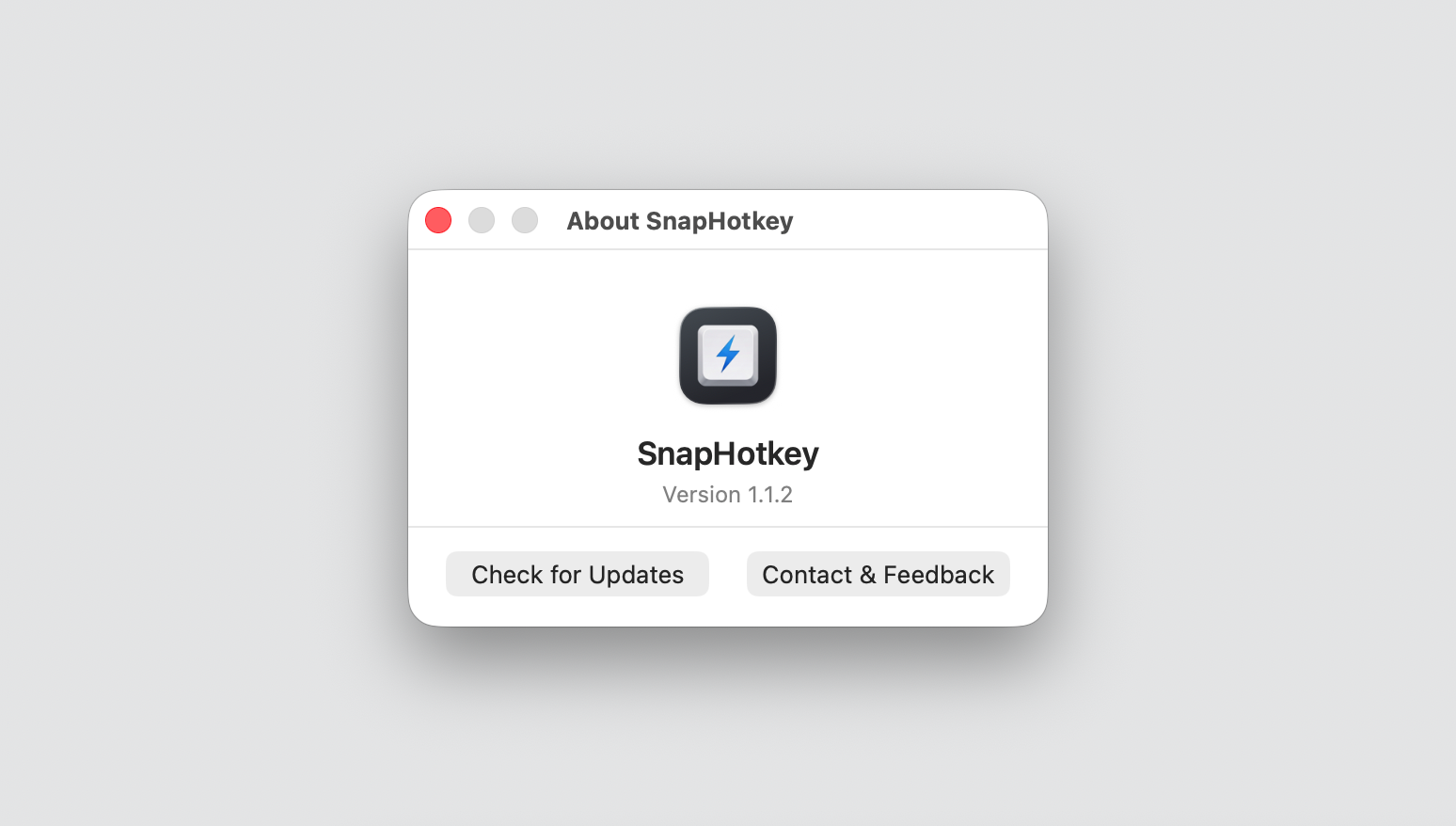SnapHotkey app icon — a white keycap with a blue lightning bolt — shown in the About window