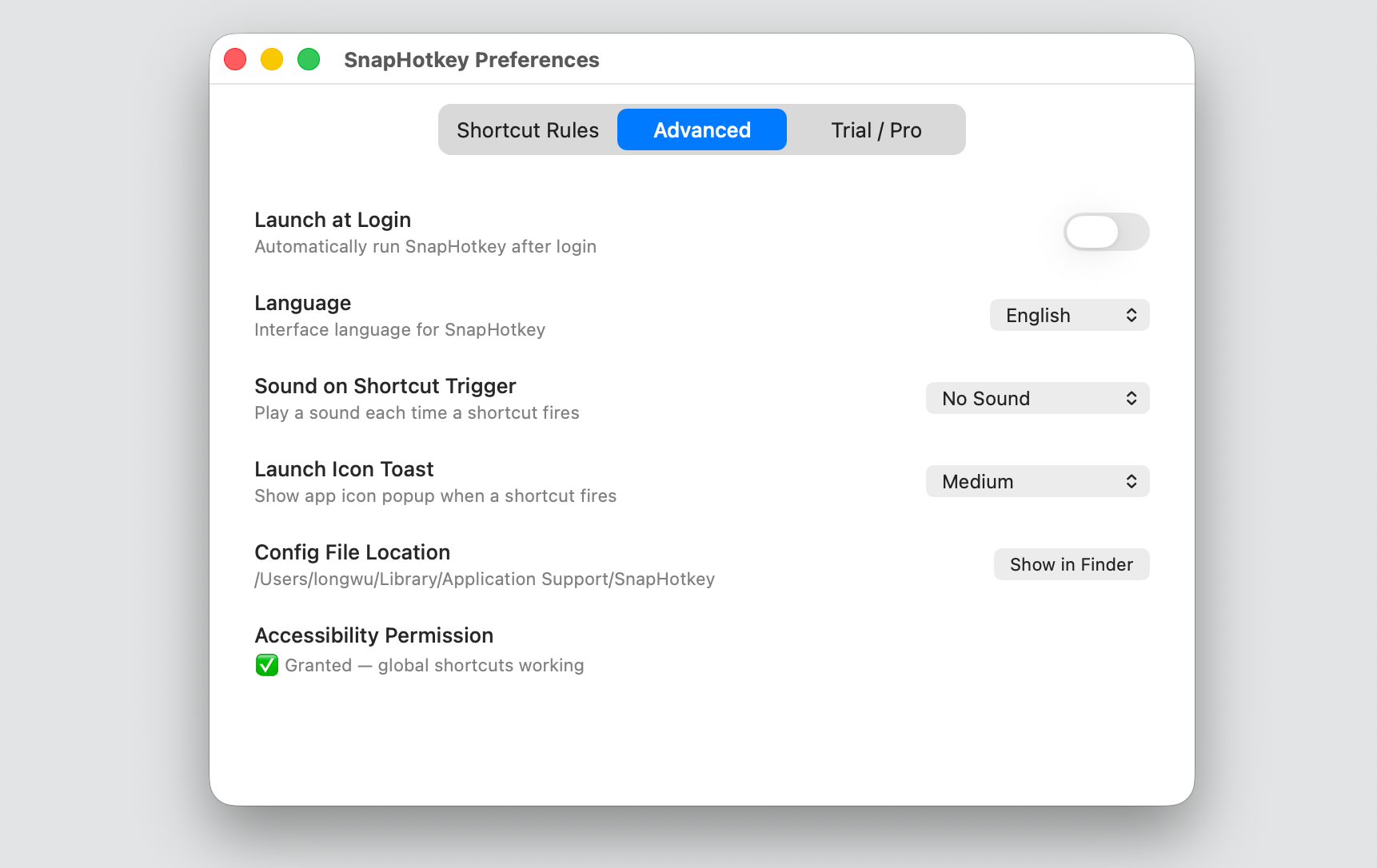 SnapHotkey's Advanced tab — Launch at Login, and the Accessibility permission shown as granted with global shortcuts working